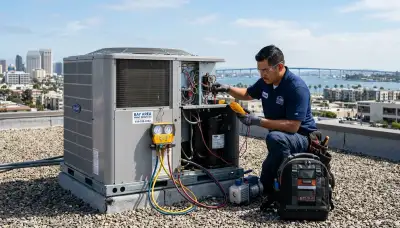 Professional AC repair technician servicing air conditioner in San Diego, CA home